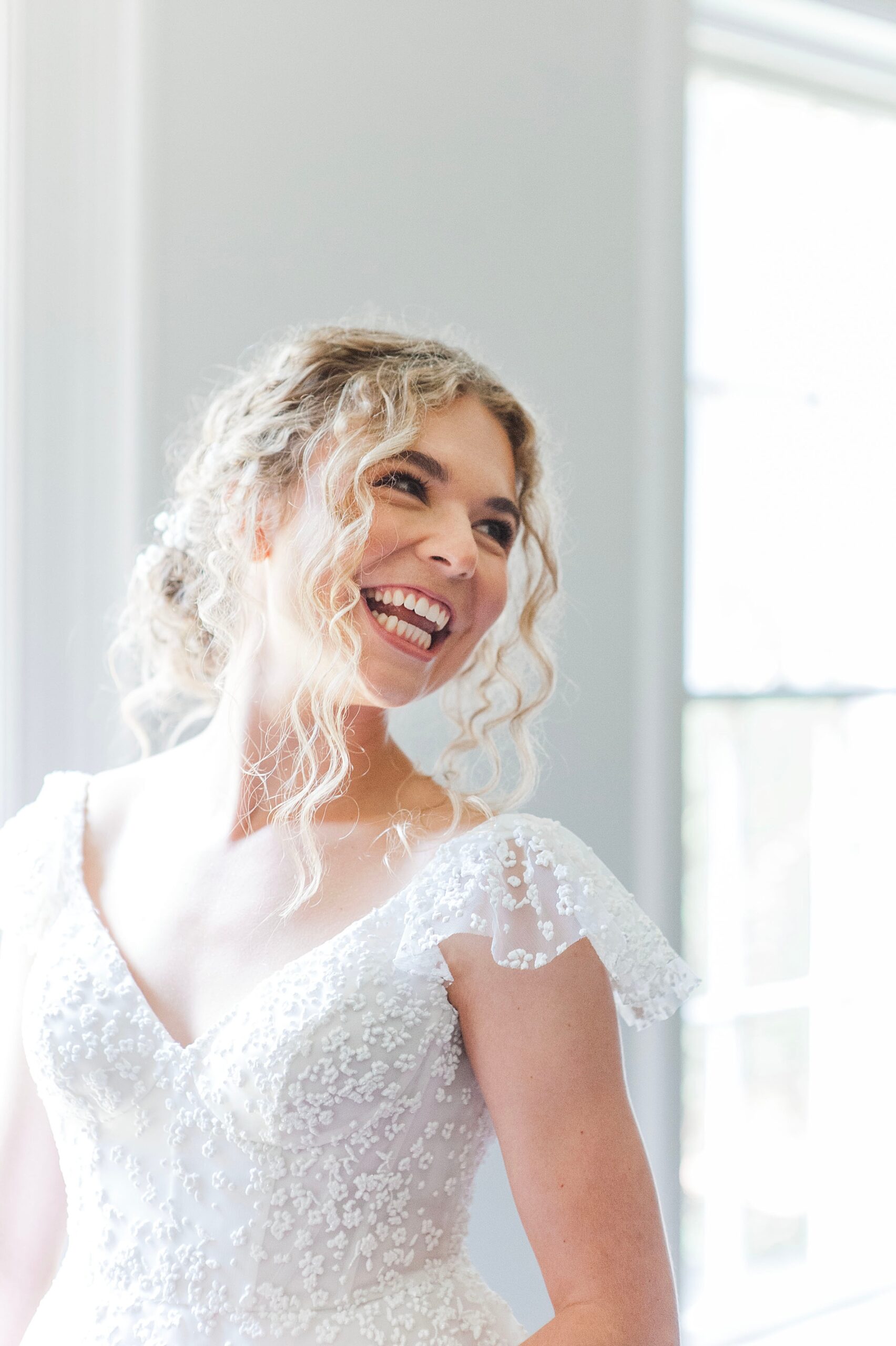 radiant bride laughing