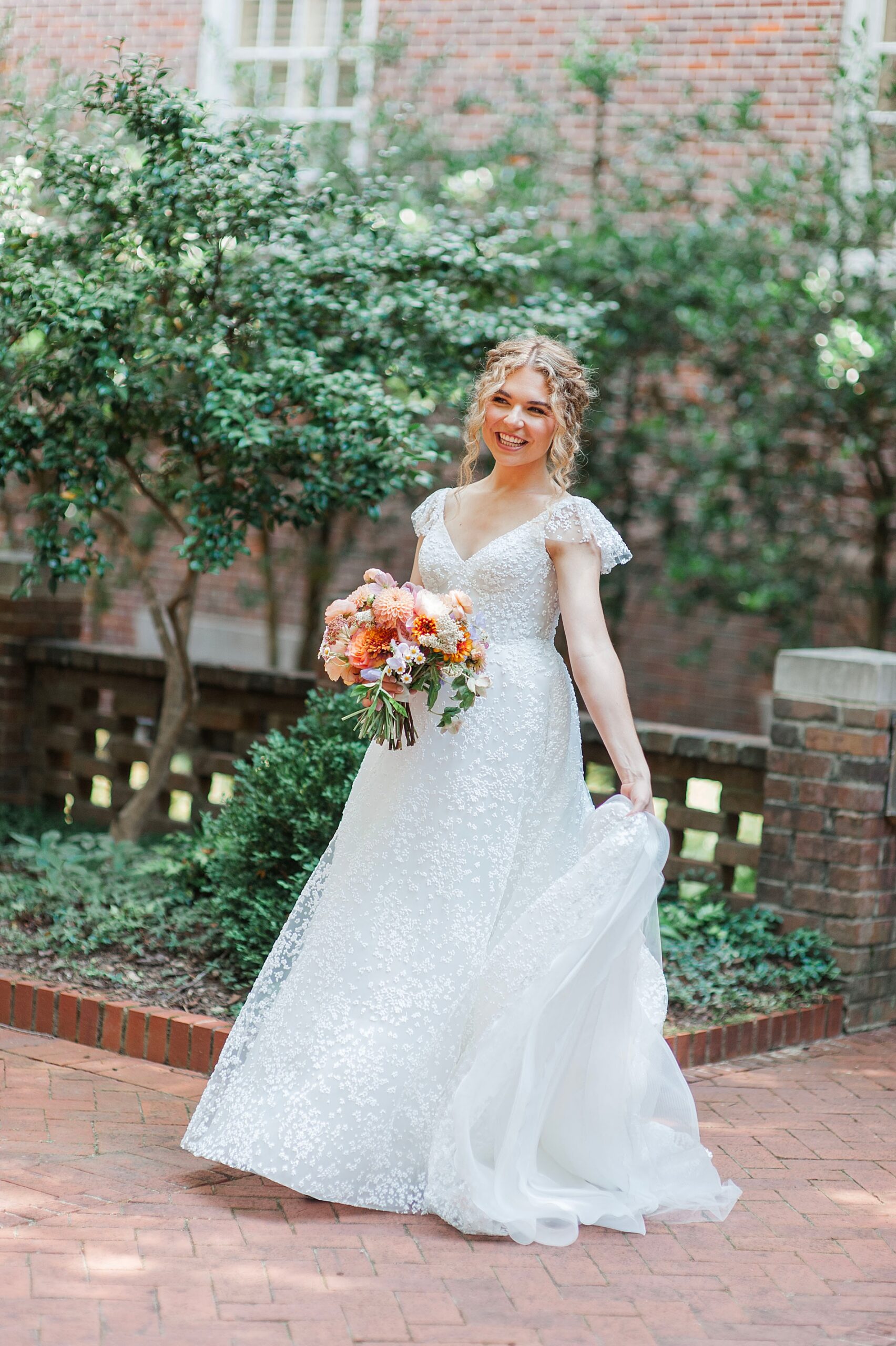 bride twirls in her wedding dress