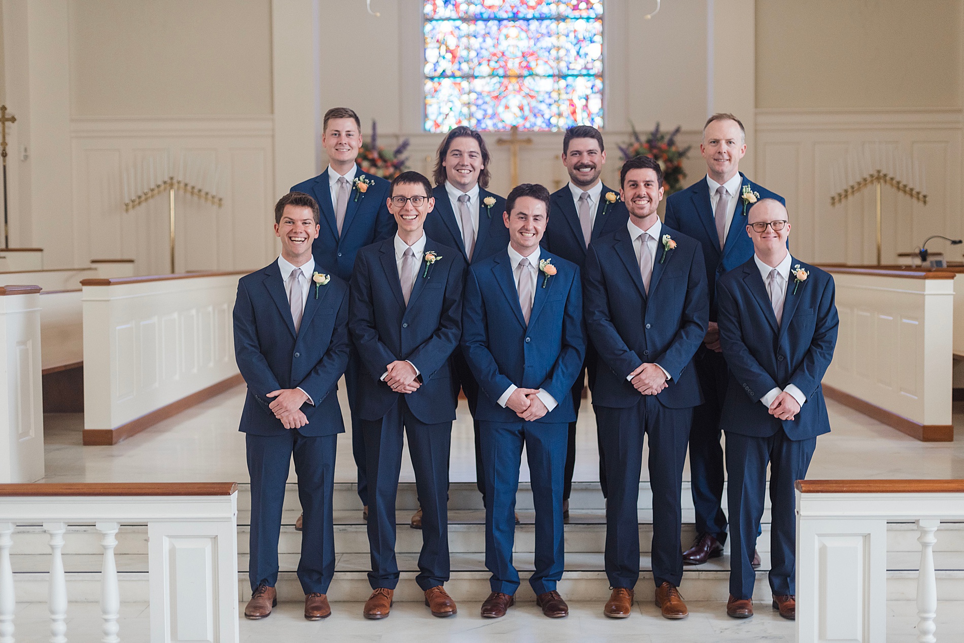 groom and groomsmen inside church