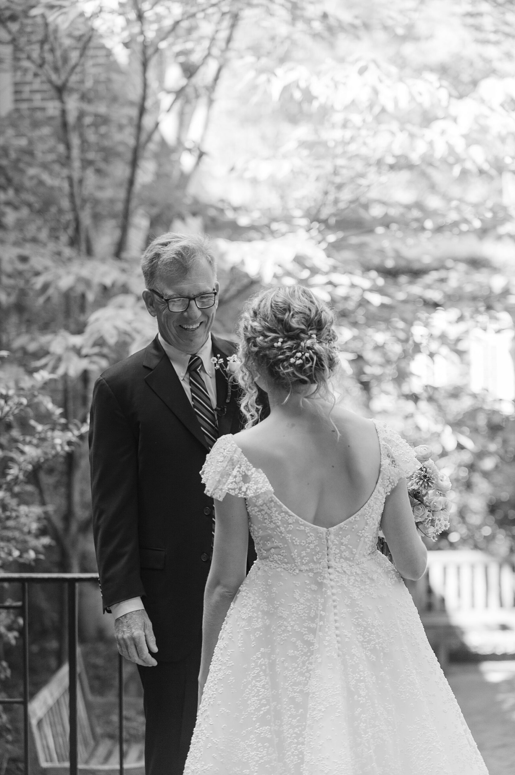 bride first look with father