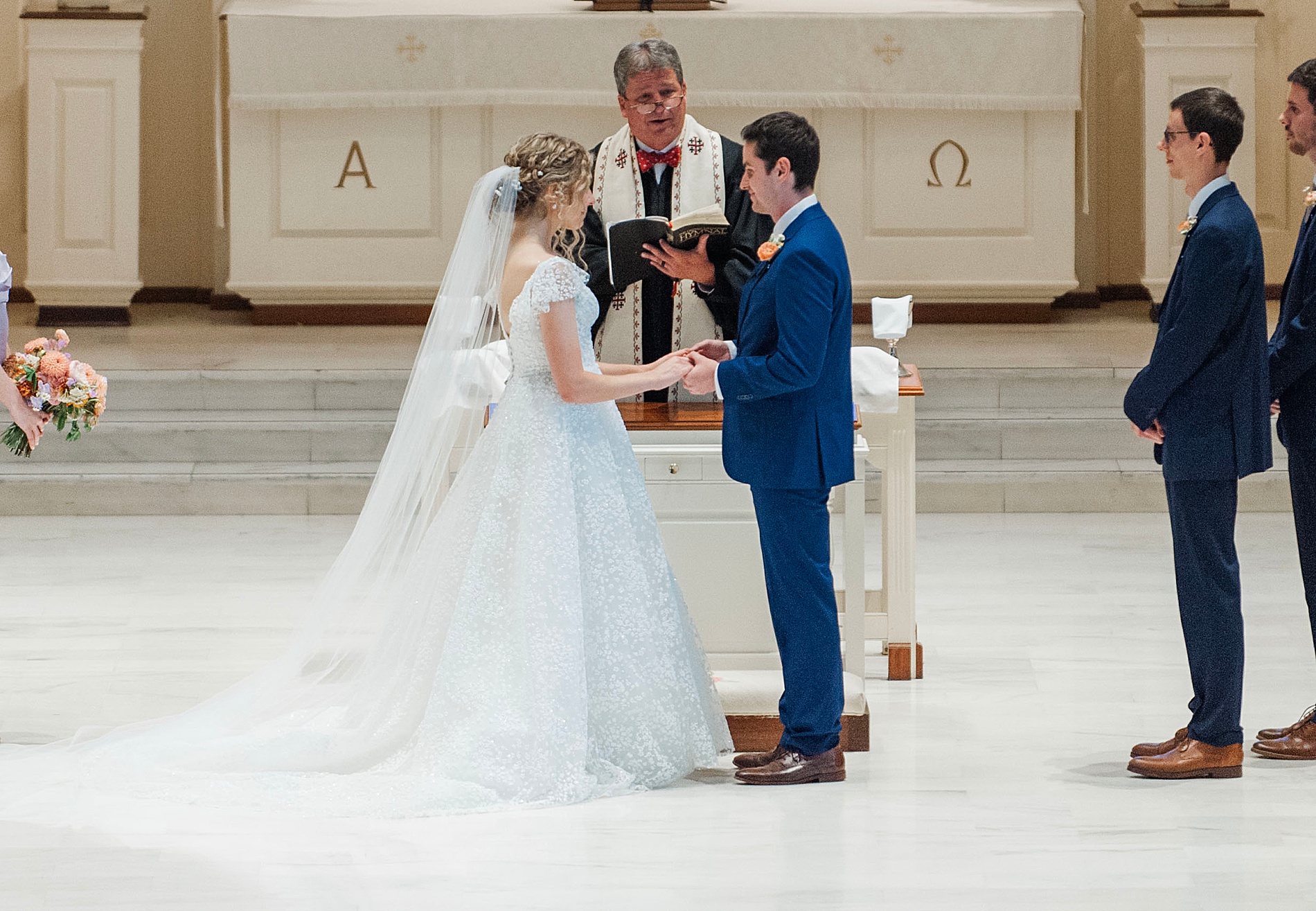 bride and groom exchange vows