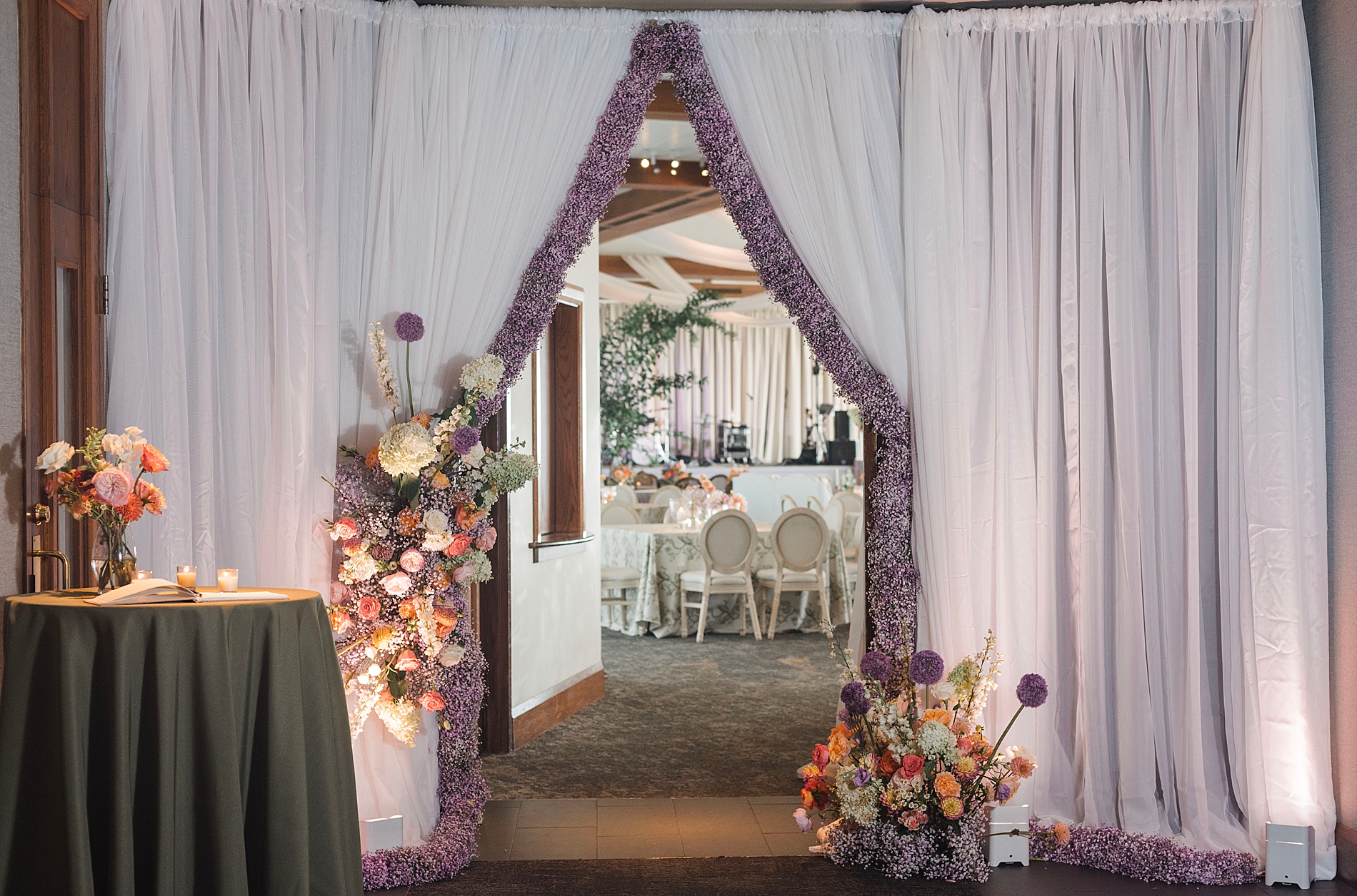 floral lined curtain at wedding reception 