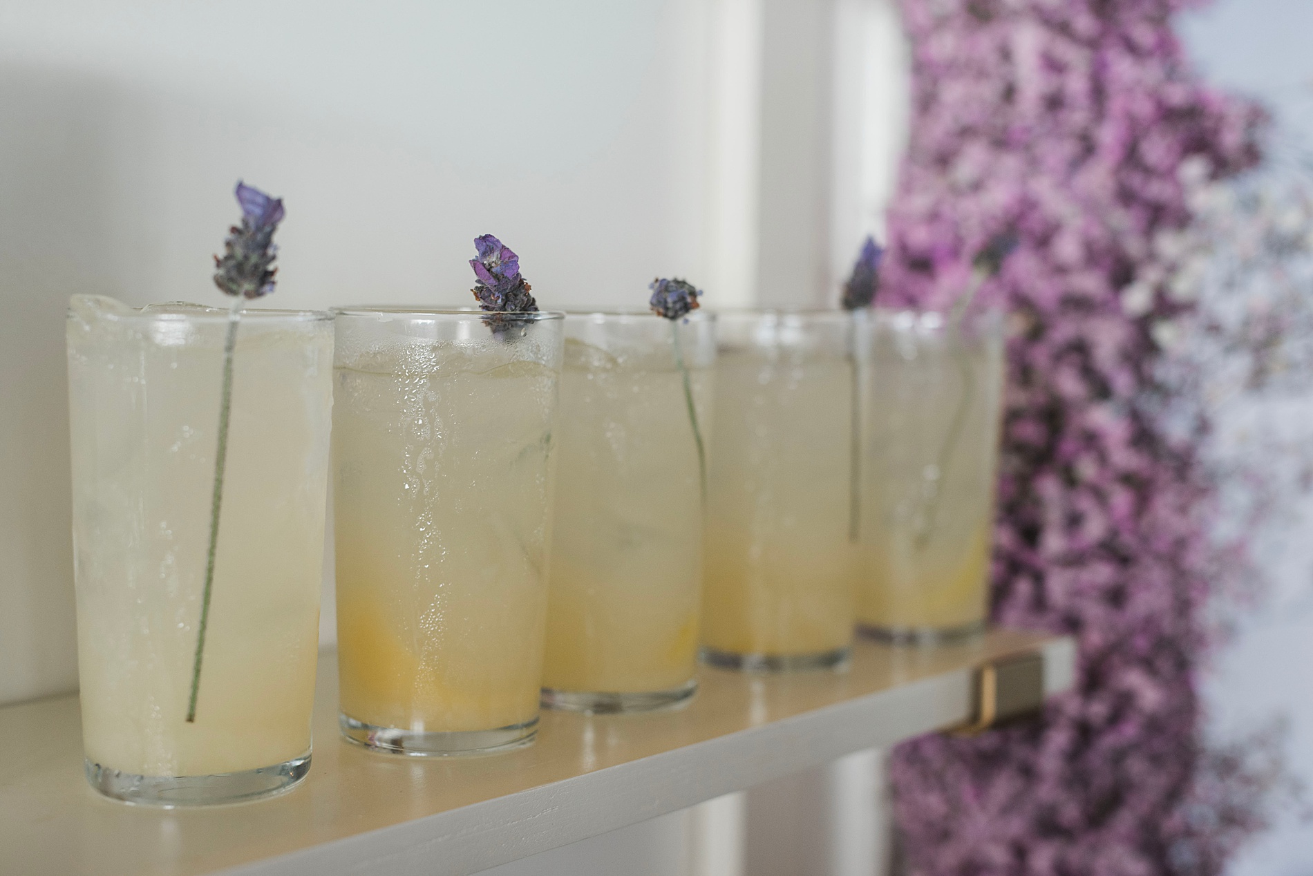 specialty cocktails with sprig of lavender  