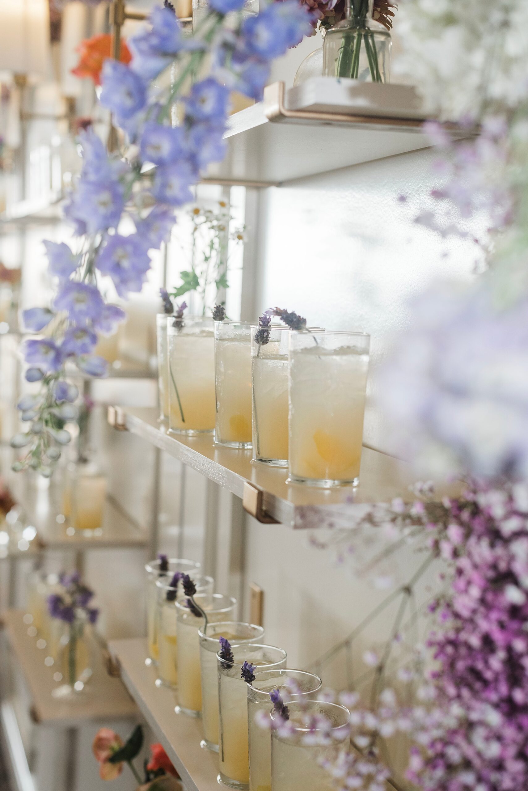 shelves on display wall hold specialty cocktails