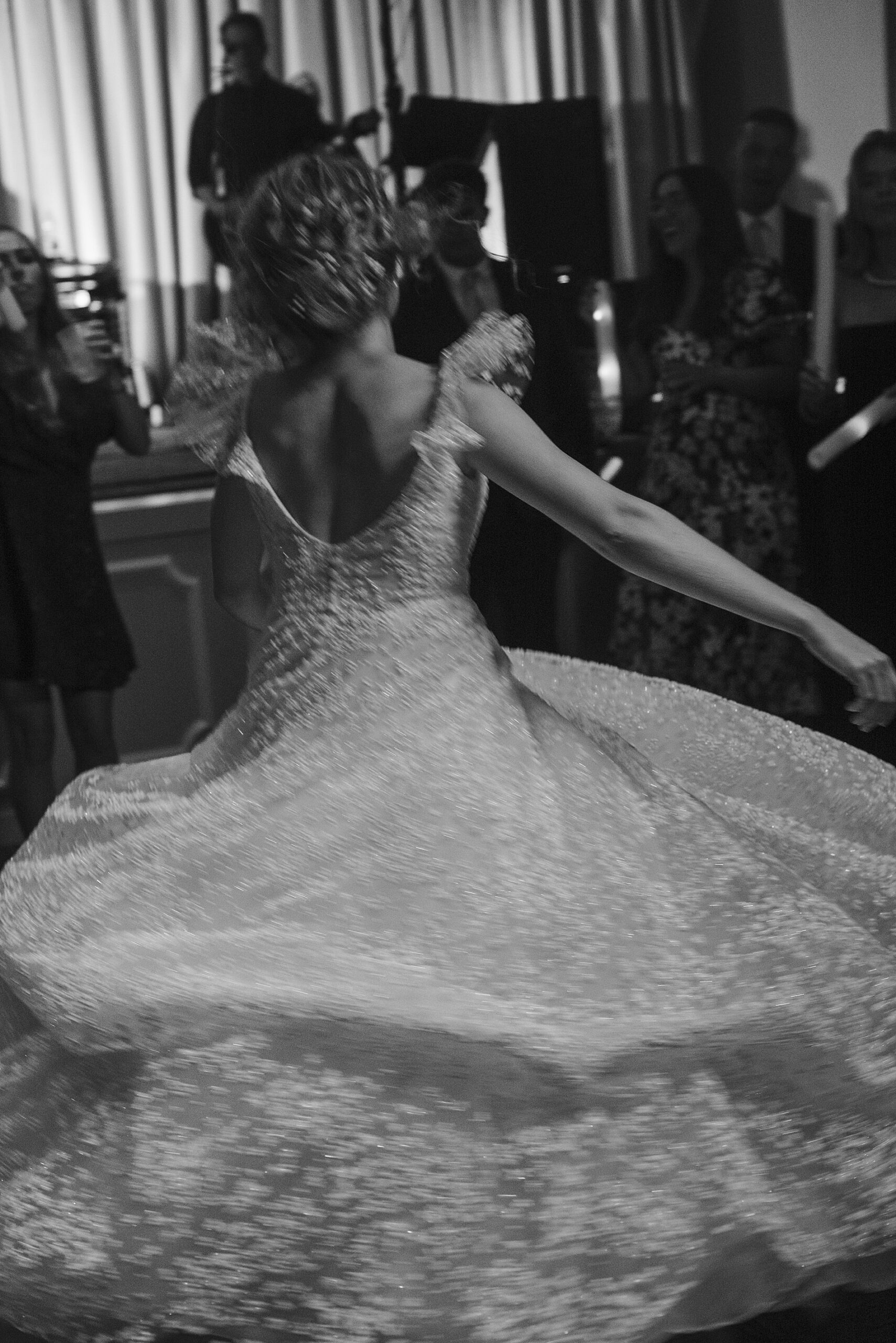 bride twirls on dance floor 