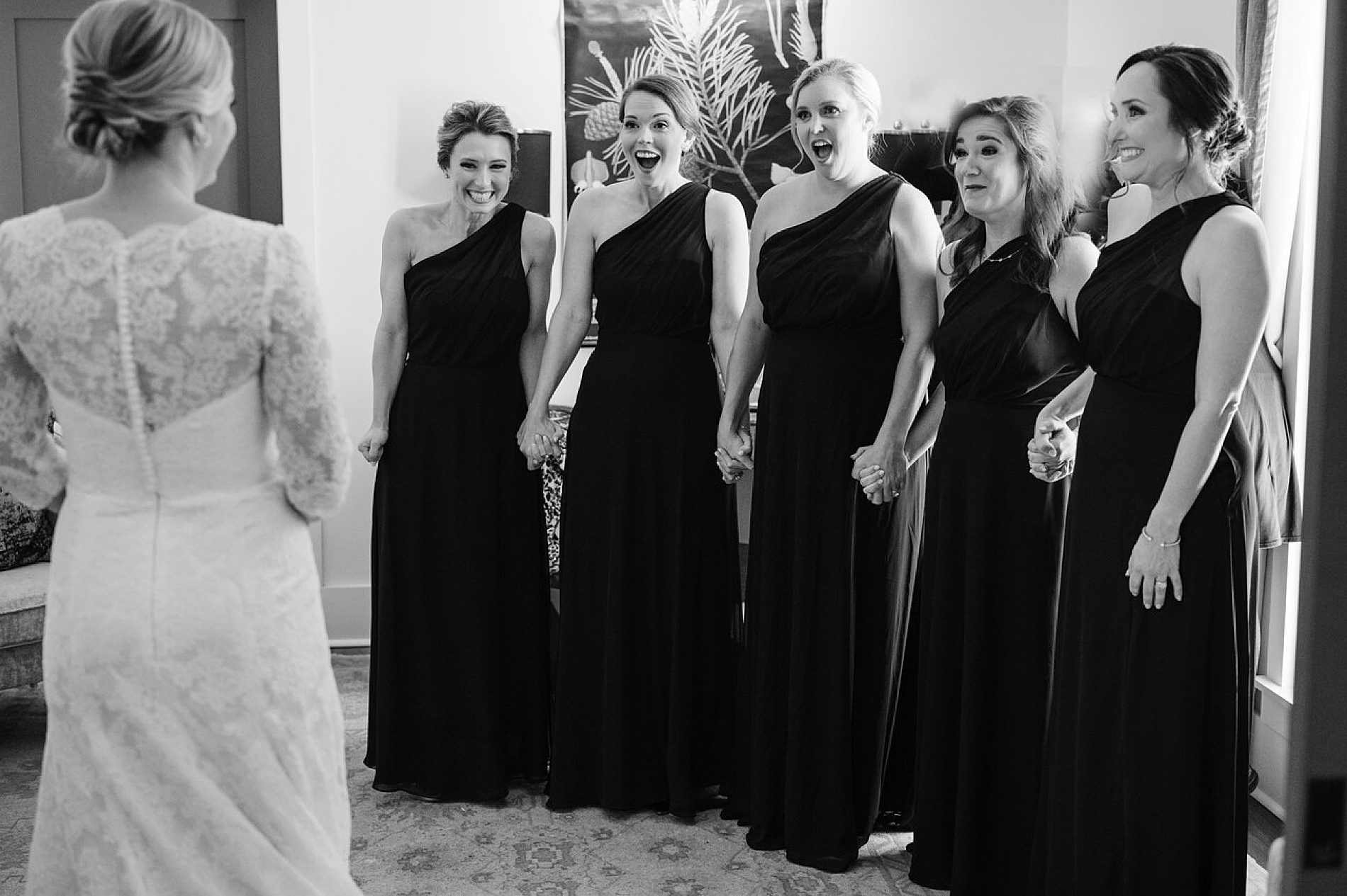 bride's first look with bridesmaids