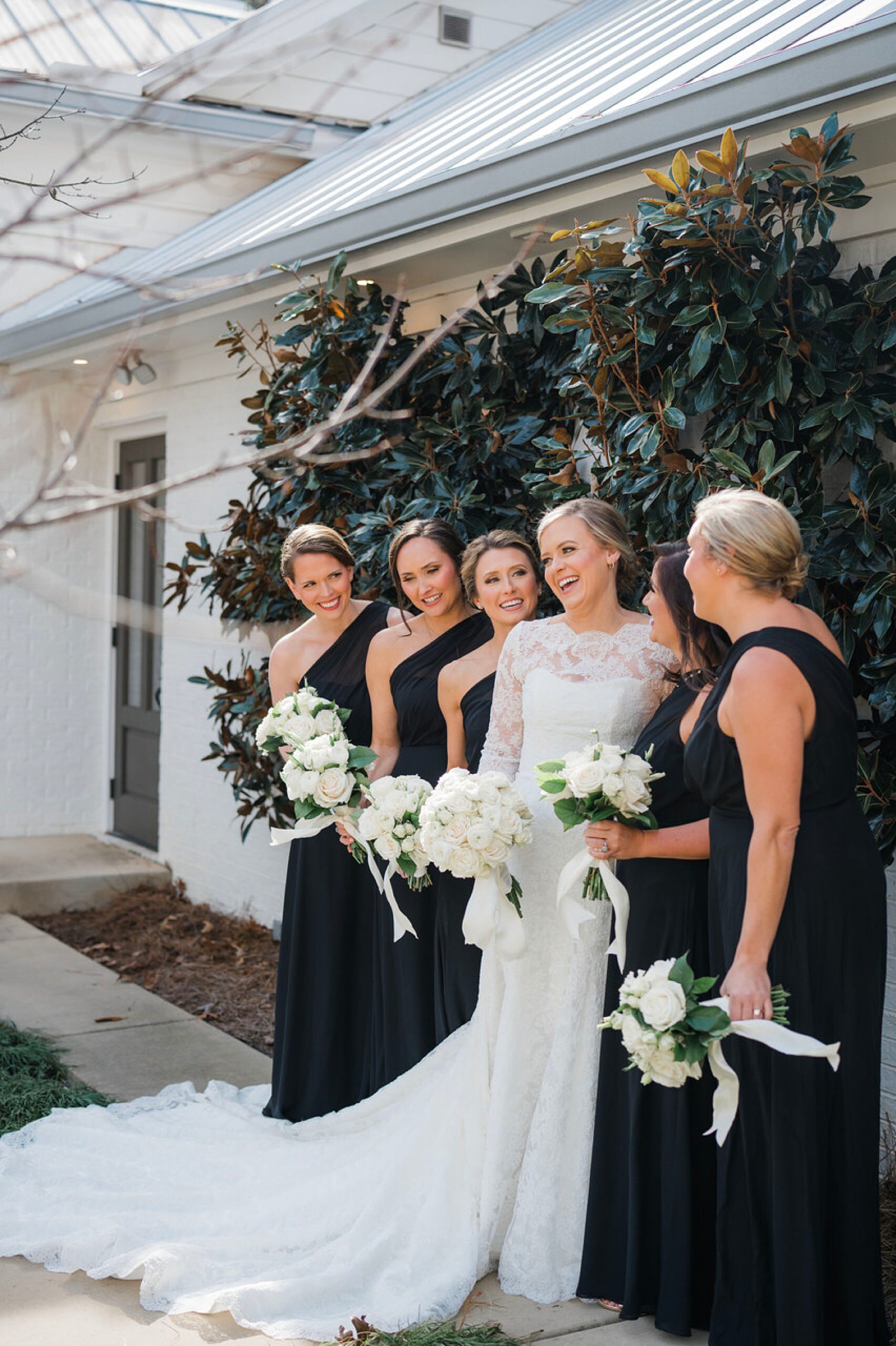 bride with bridesmaids in black dresses from Joyful Witt House Wedding 