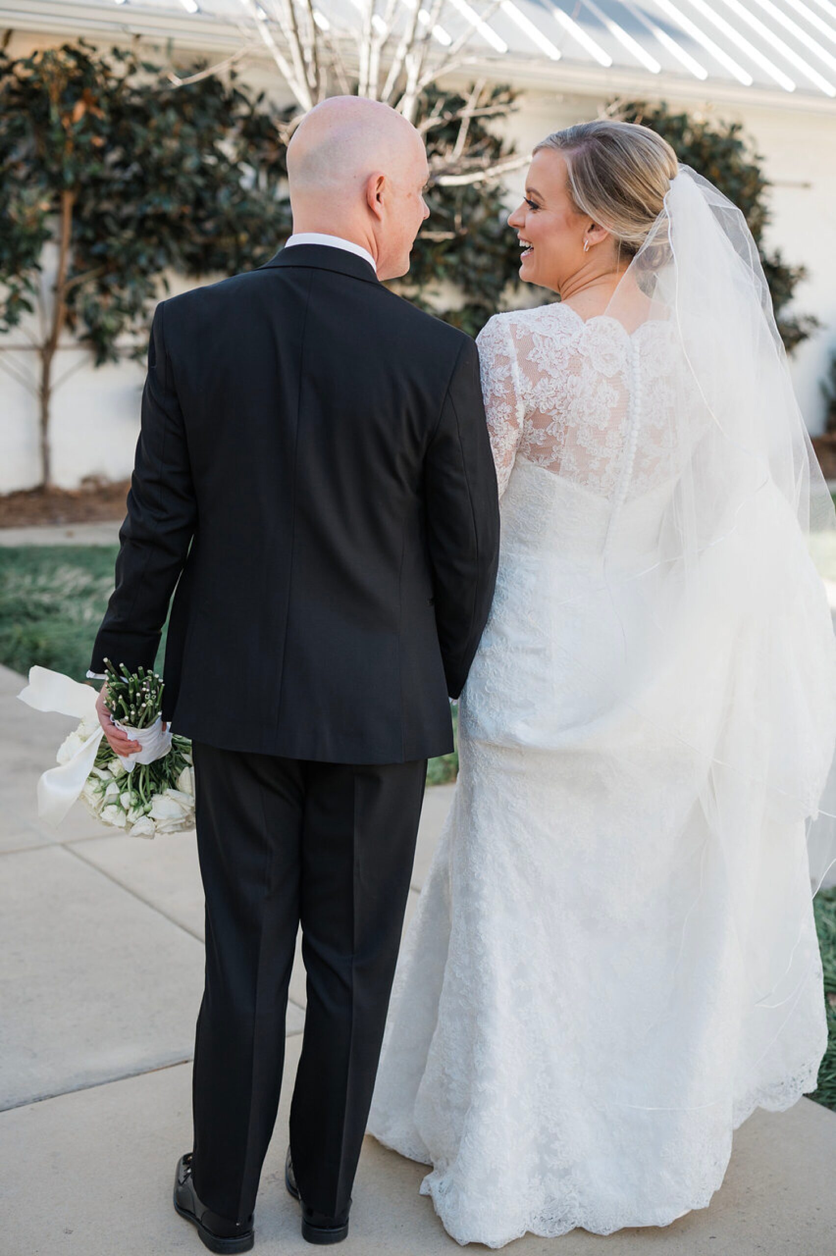 bride and groom walk together