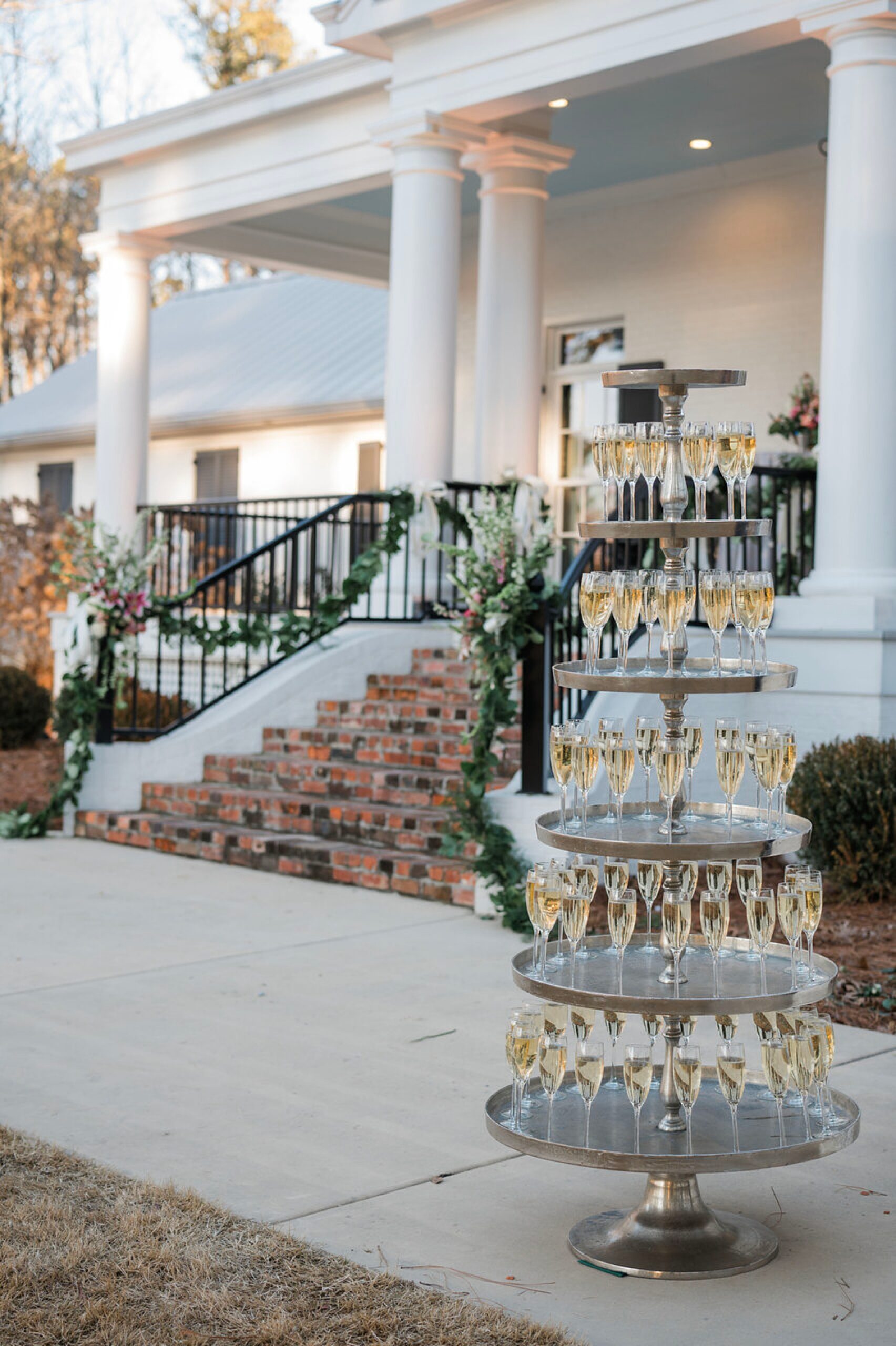 guests greeted with champagne as they arrive at cocktail hour at The Witt house