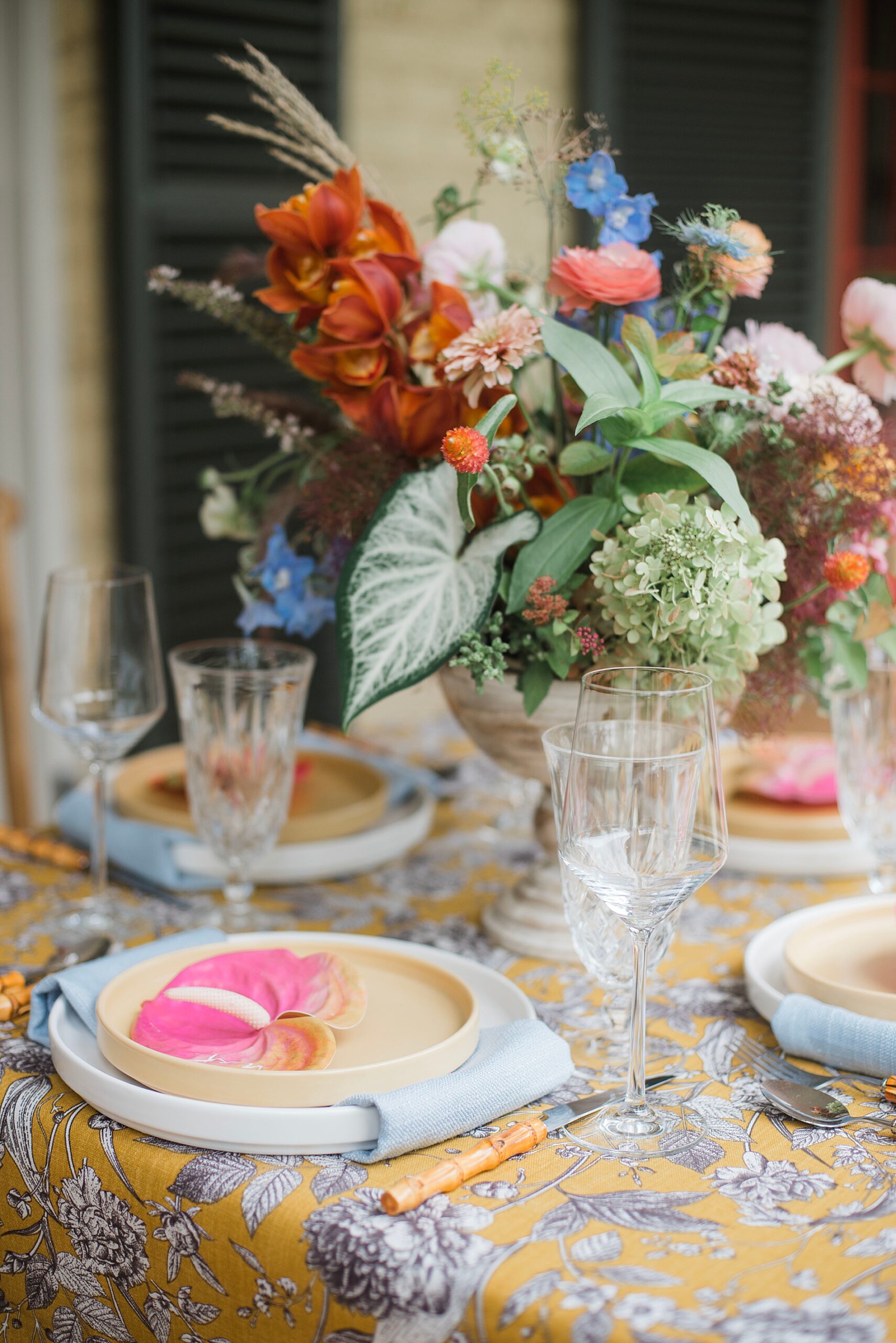 yellow tablecloths with blue designs from heirloom collection of items at this Elegant Bridal Brunch