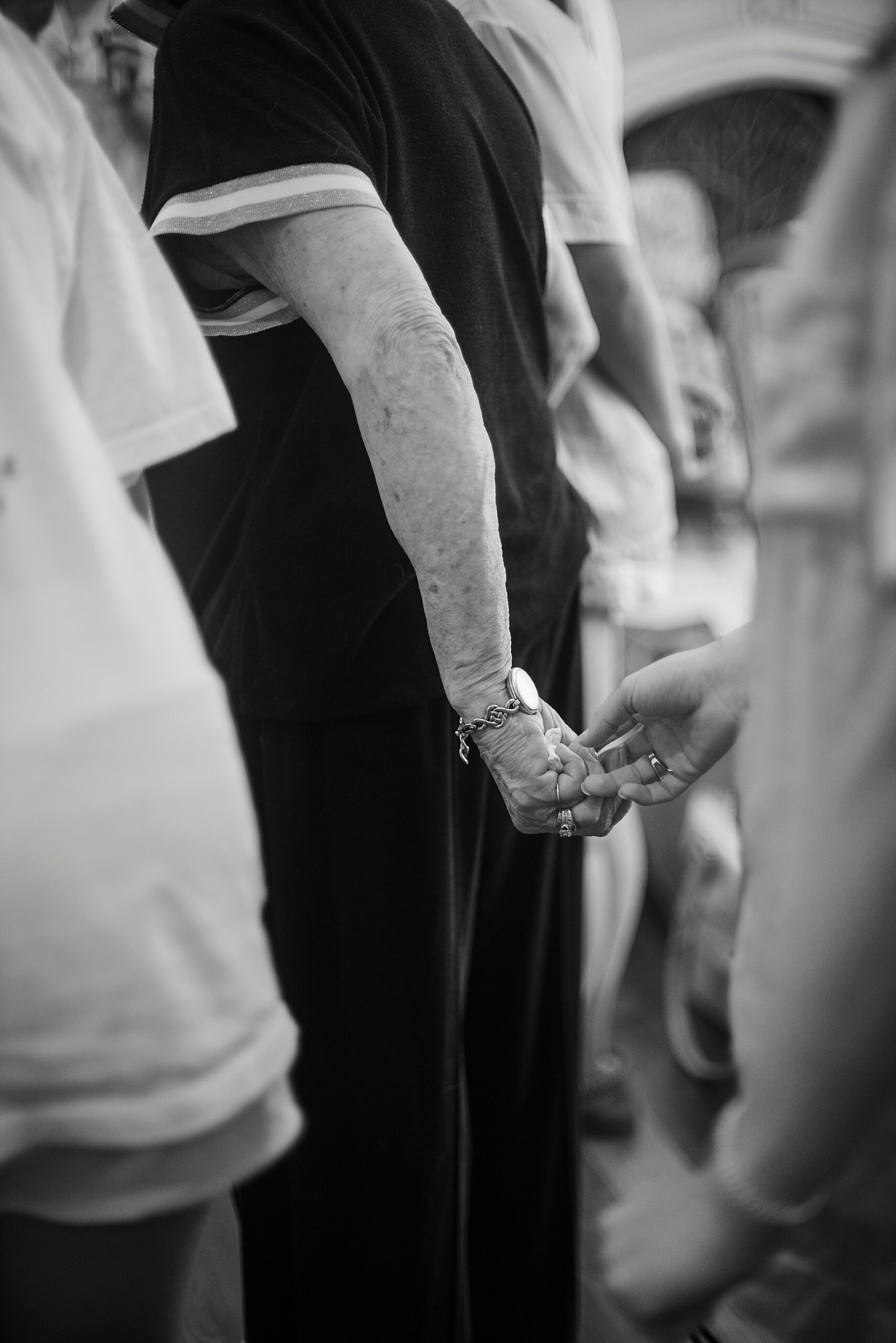 grandmother holding hand from Heartfelt North Carolina Wedding