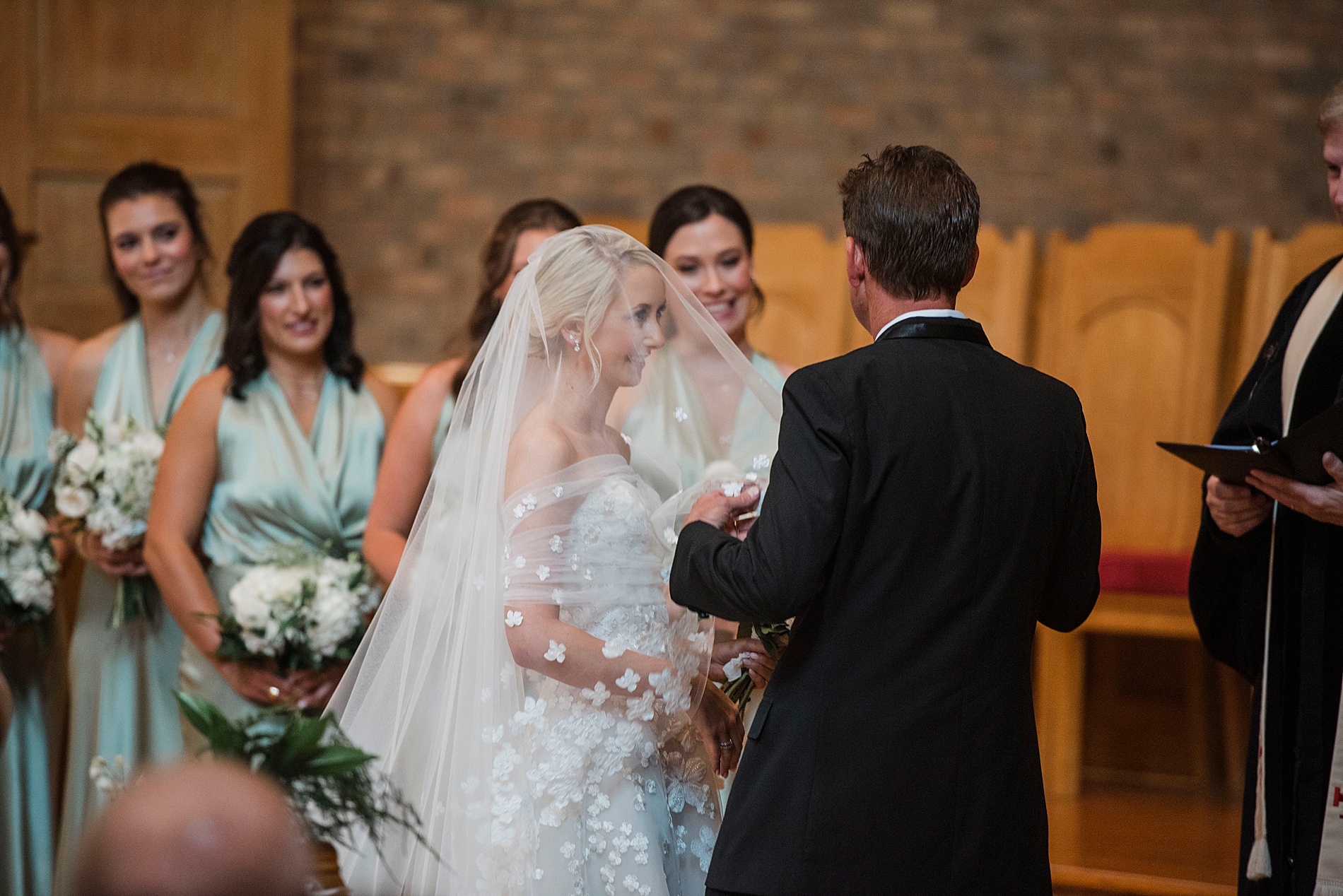 bride and groom exchange vows during Heartfelt North Carolina Wedding