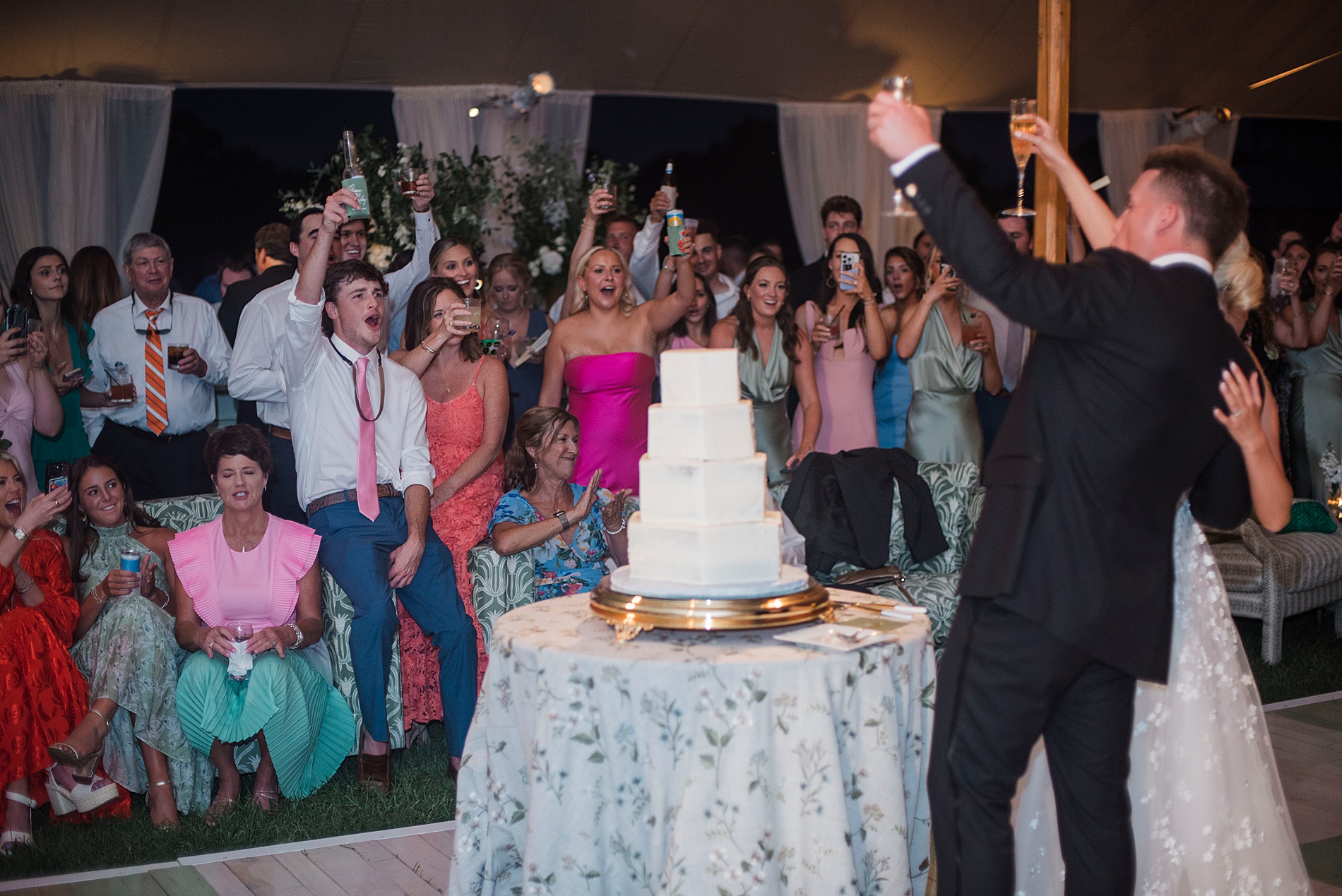 bride and groom cut their cake