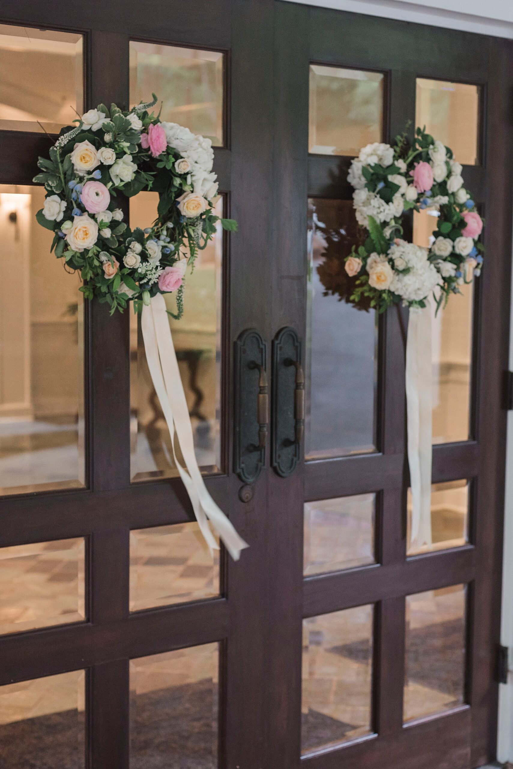 doors to church with flower wreaths