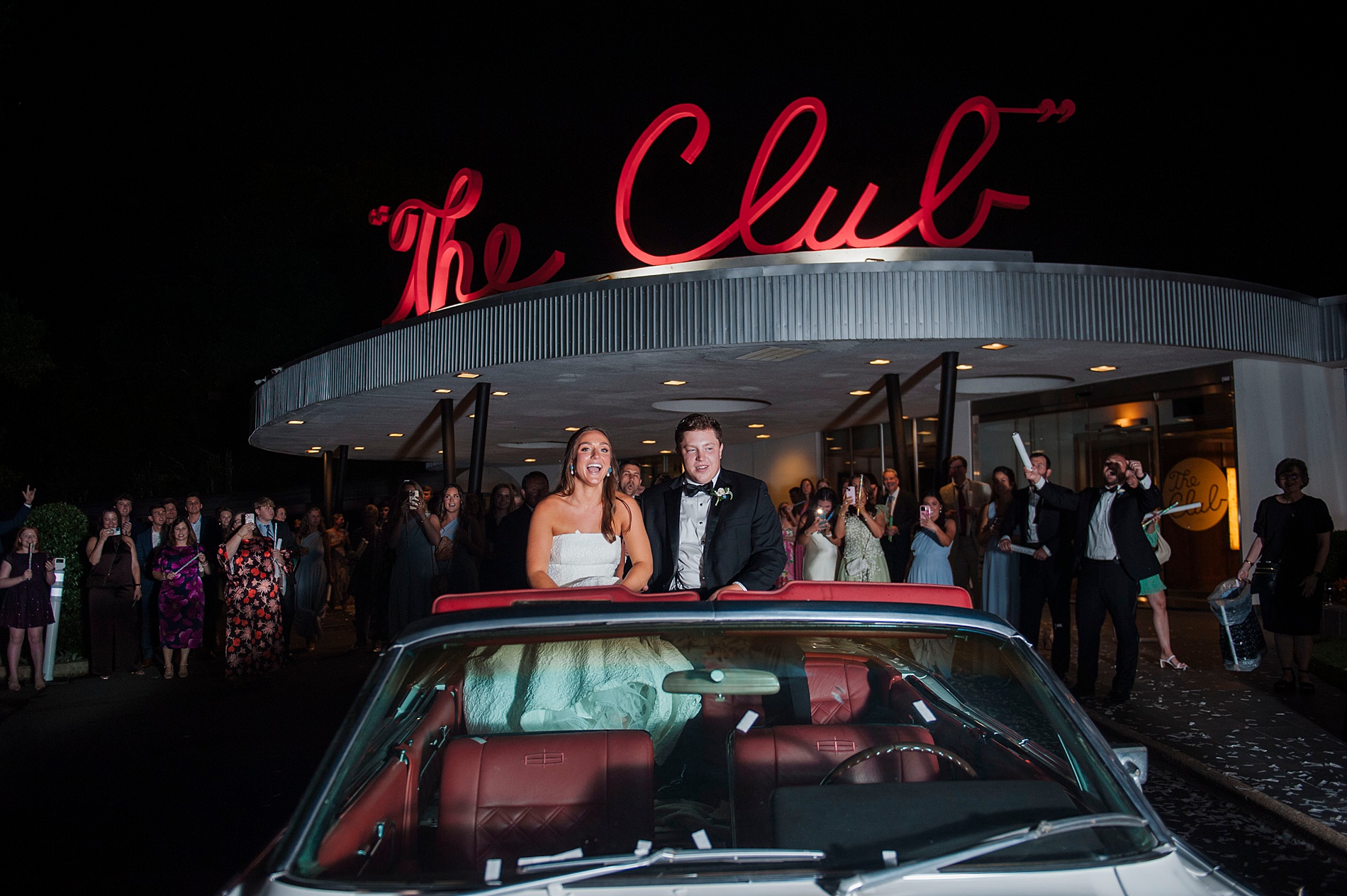 Newlyweds drive off in convertible getaway car