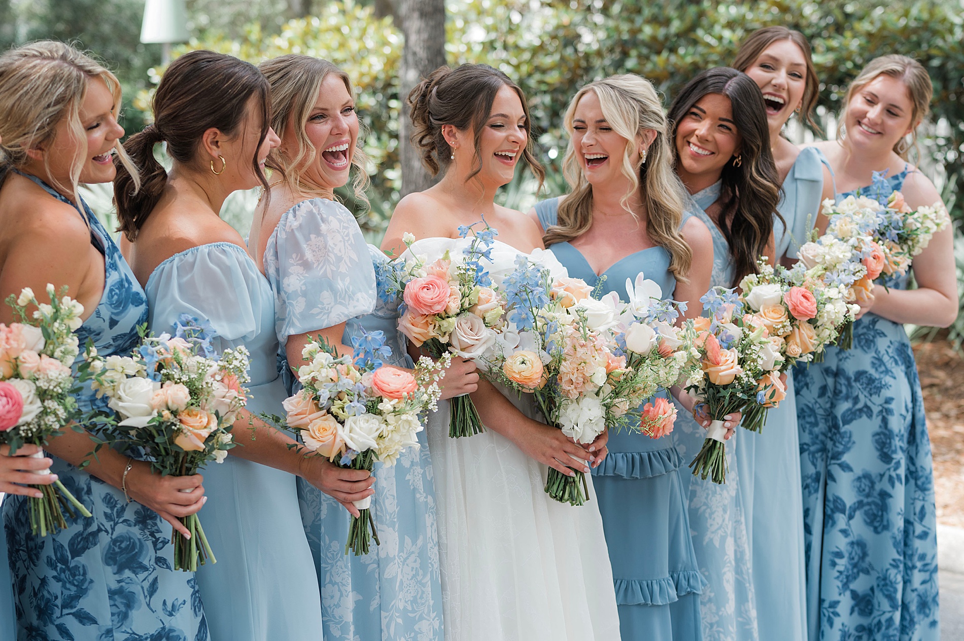 bridal party laughs together