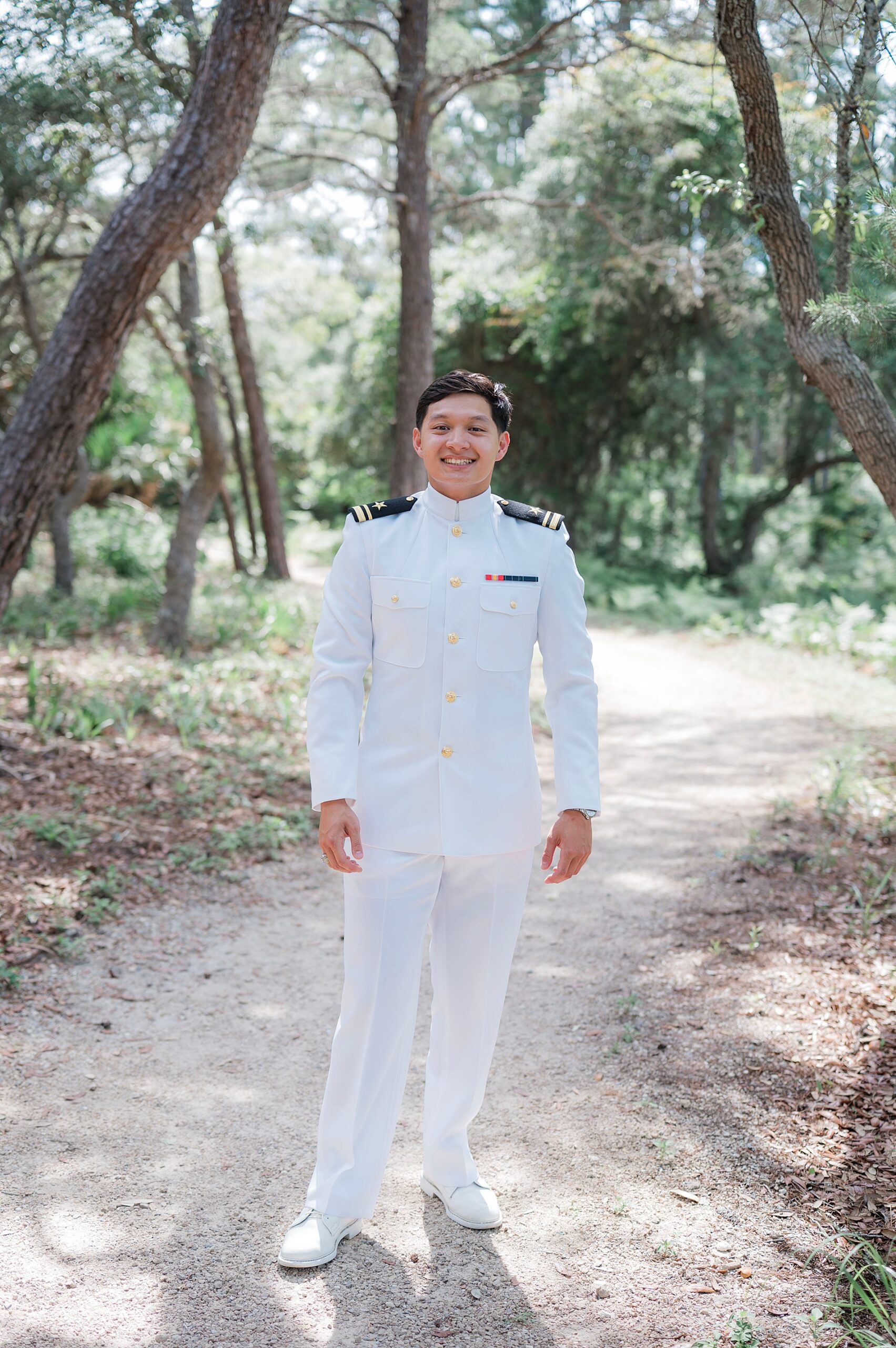 groom in white Navy uniform