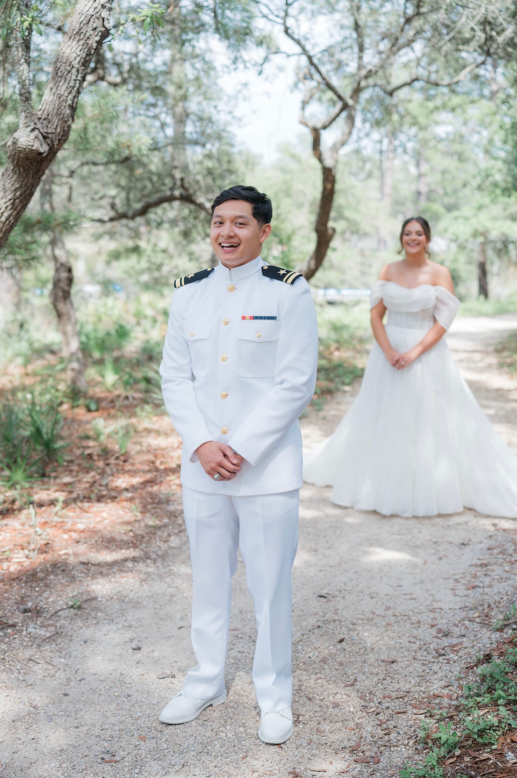 bride walks up behind groom for first look