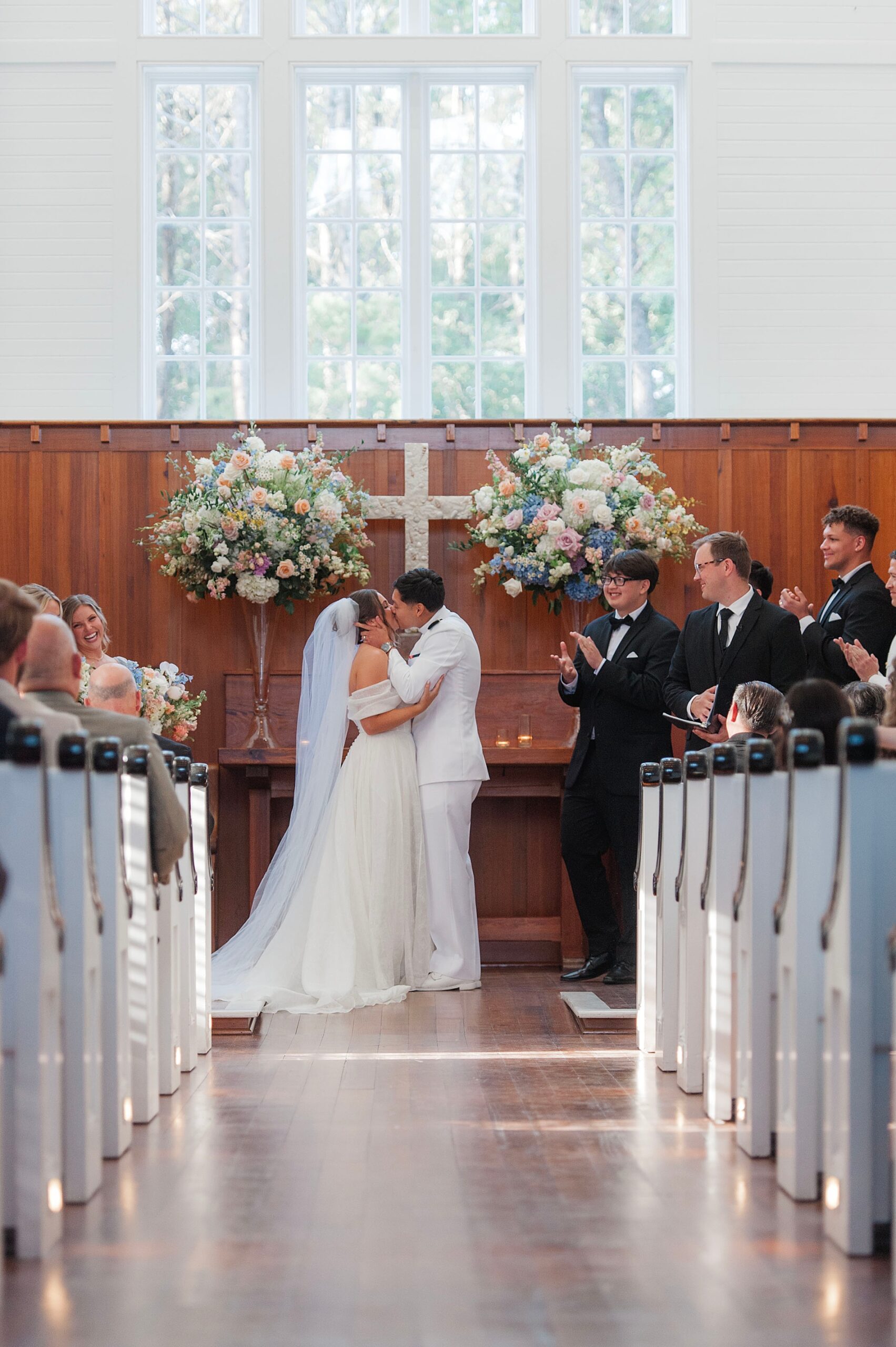newlyweds kiss at wedding ceremony