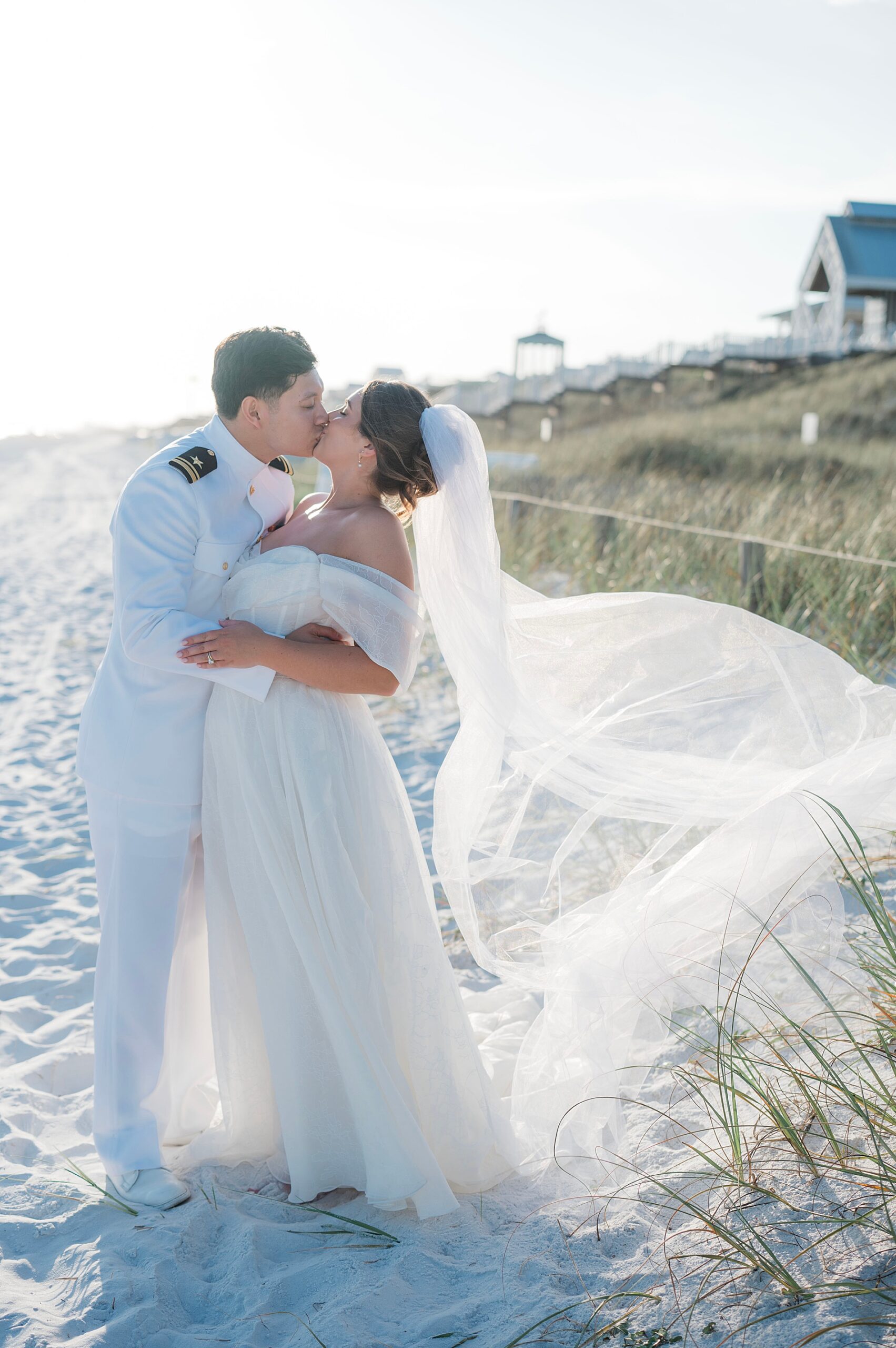 newlyweds kiss on 30A Florida beach