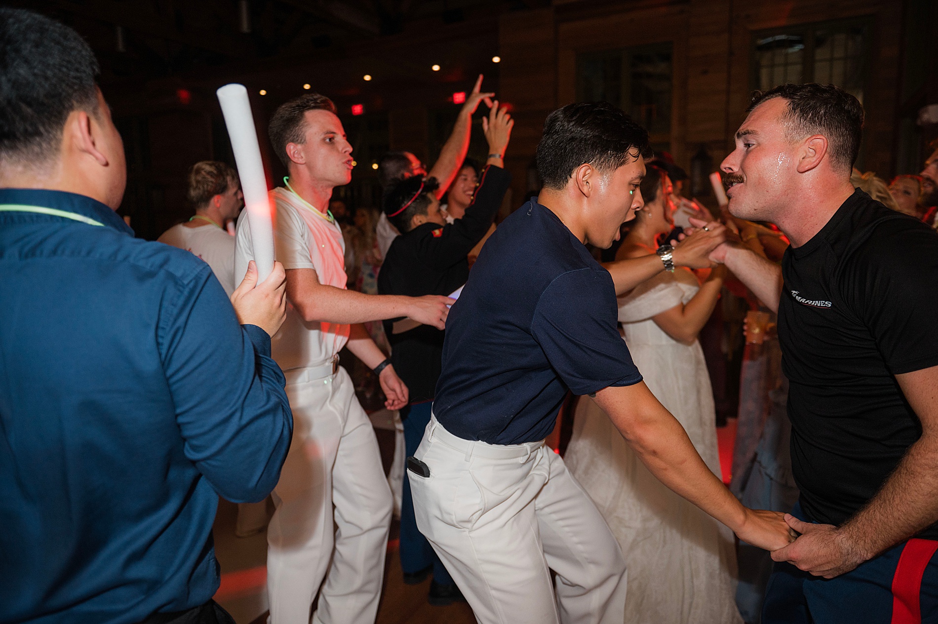 guests dance during wedding reception