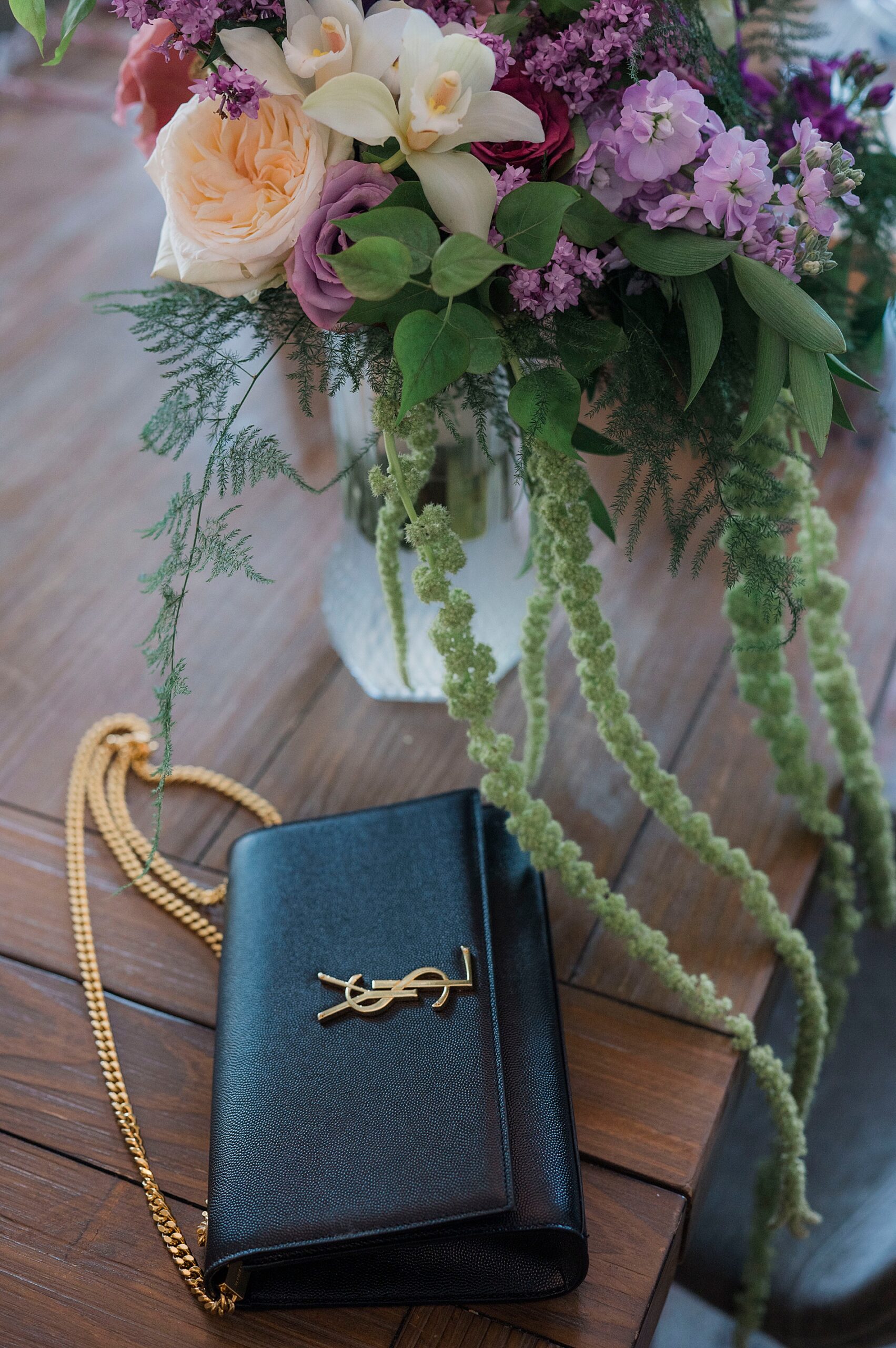 bridal bouquet and clutch