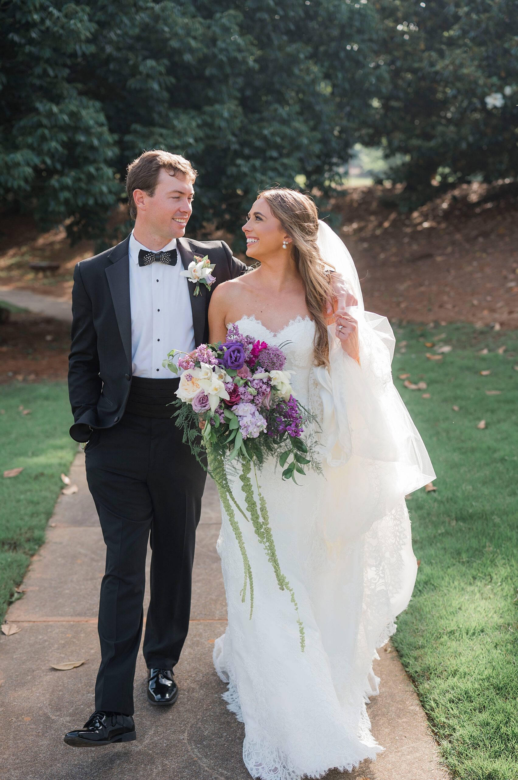 bride and groom walk together