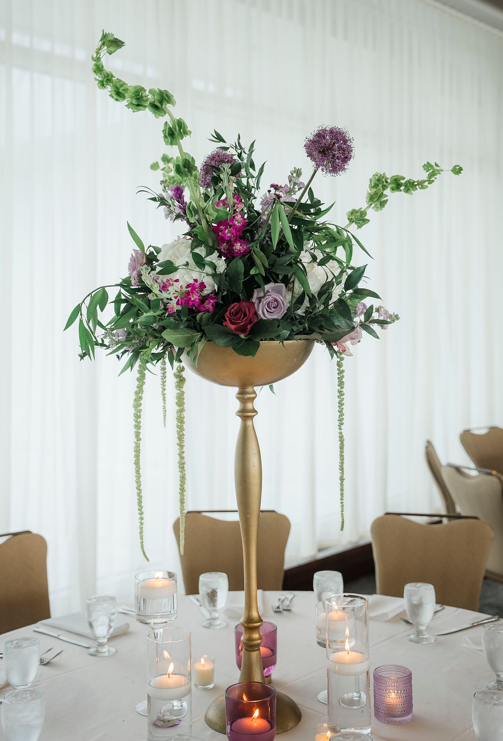 wedding flower centerpieces in high gold vases
