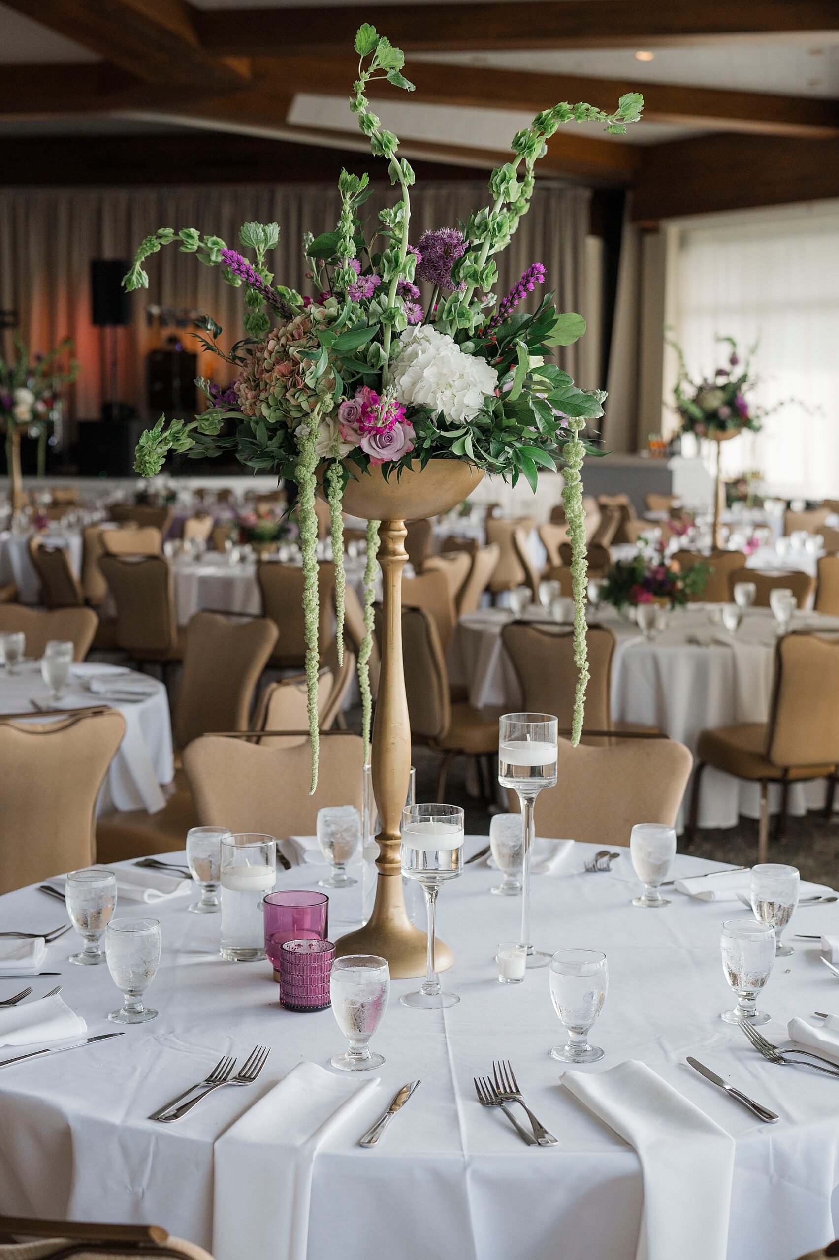 Elegant Spring Wedding reception at The Club with stunning flower centerpieces
