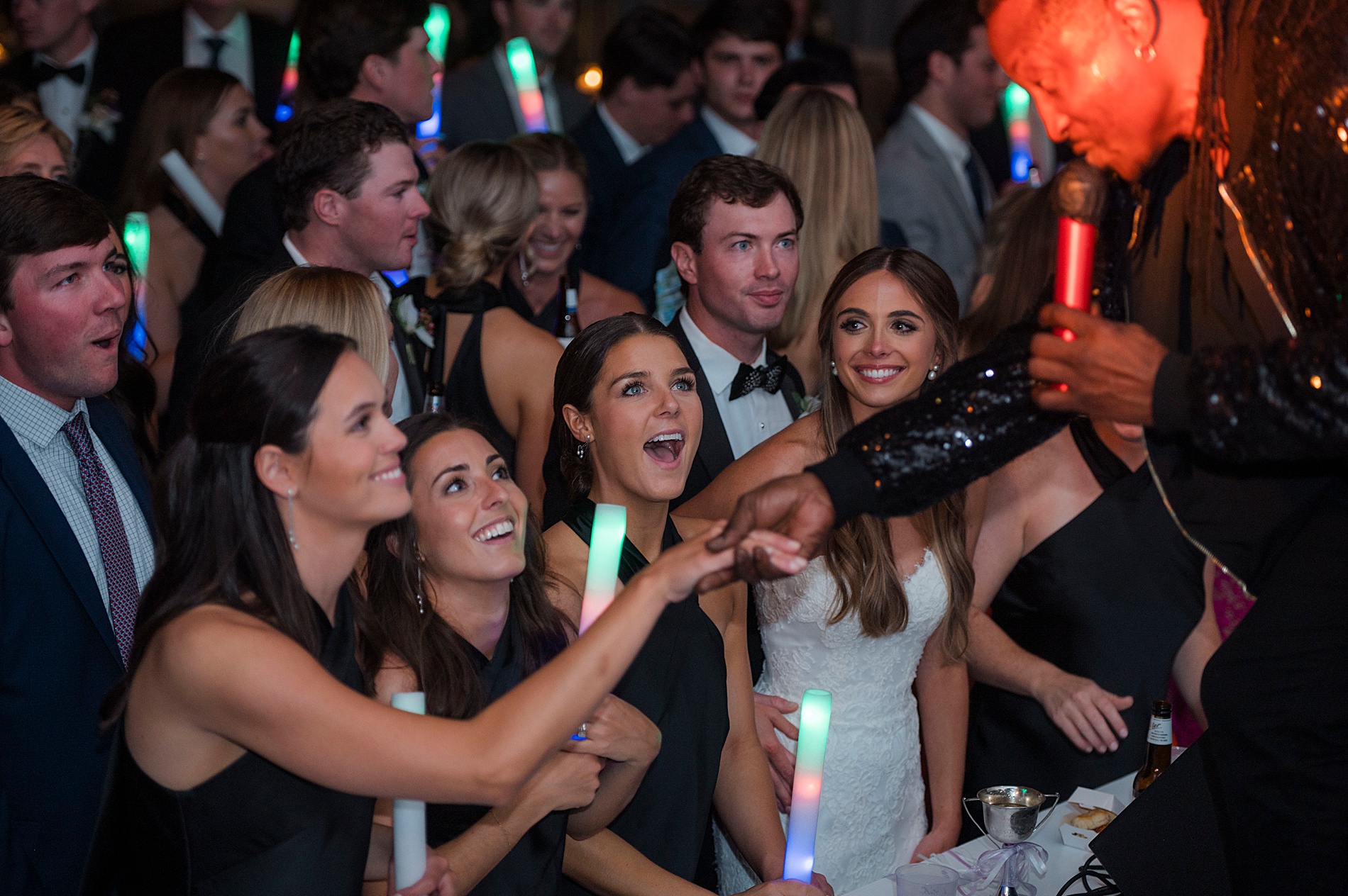 bride and guests on dance floor at reception