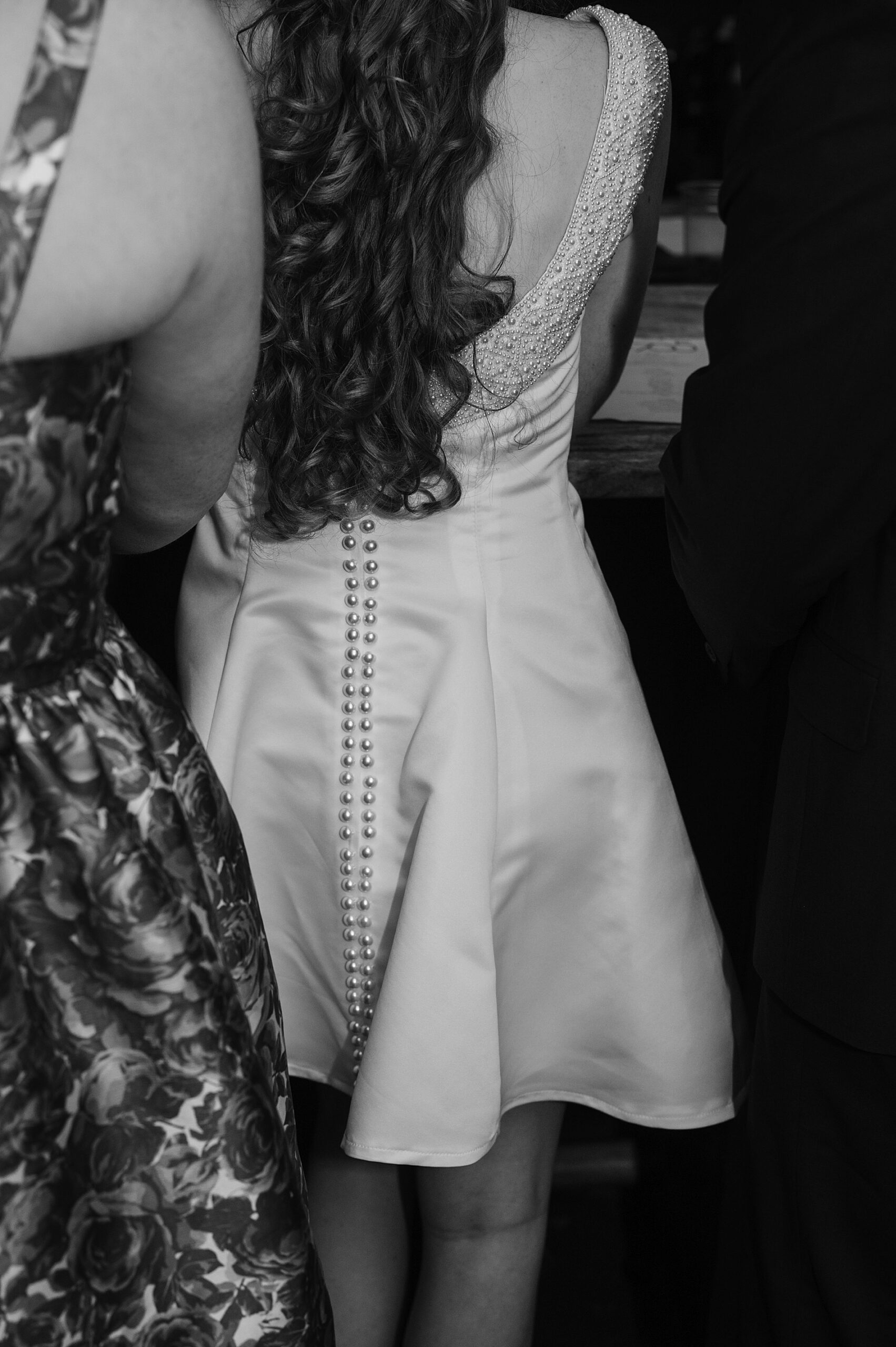 back of rehearsal dinner dress