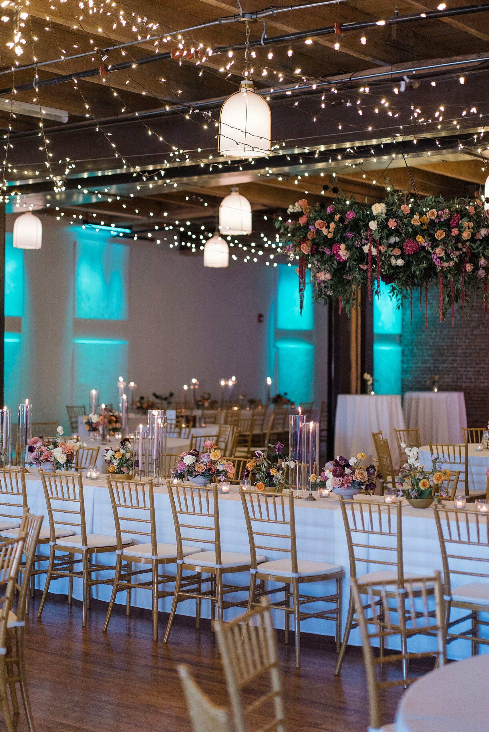elegant wedding reception at The Fennec with stringed lights decorating ceiling