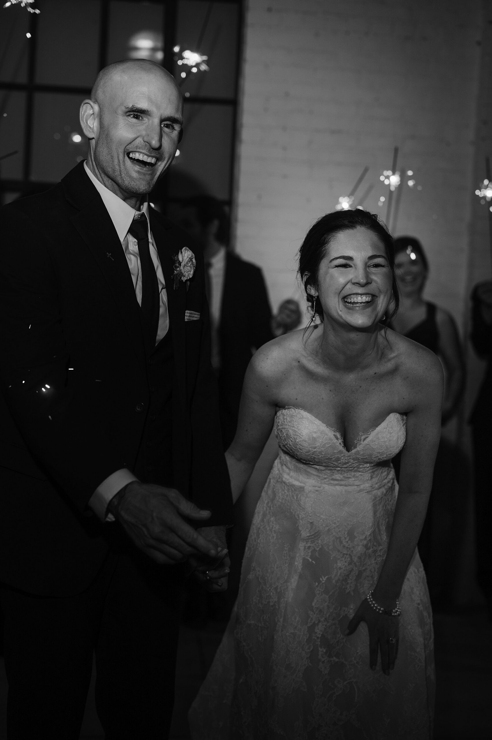 candid wedding photos of bride and groom during wedding exit