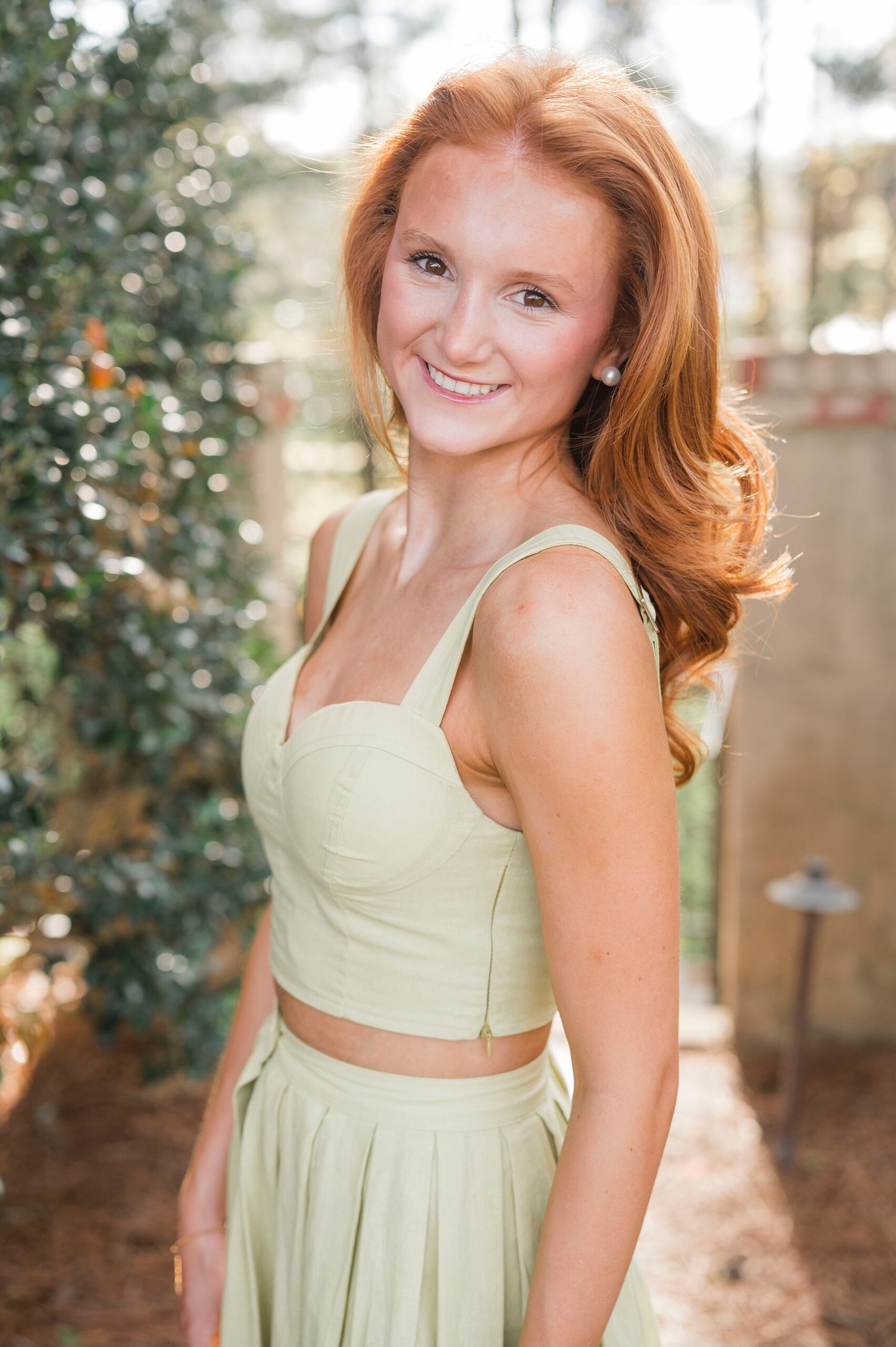 senior girl poses for portraits 
