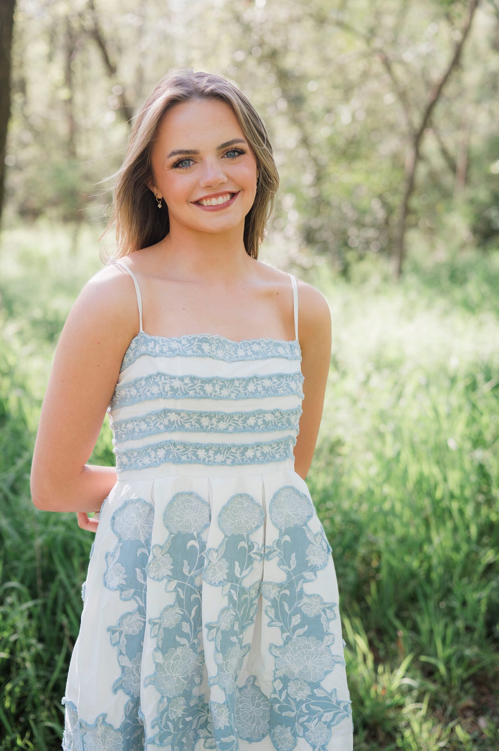Spring Senior Sessions of girl in white and light blue dress