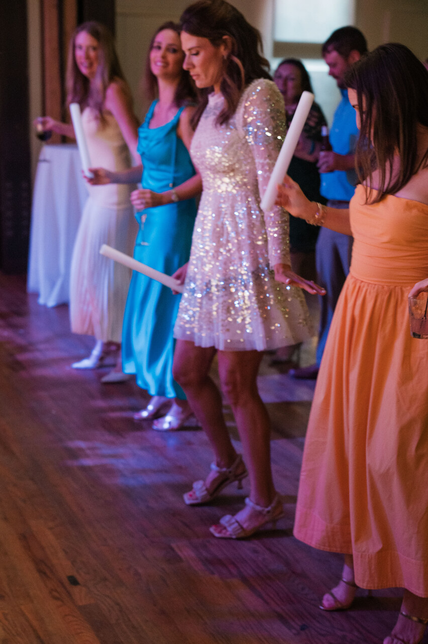 bride and guests on dance floor