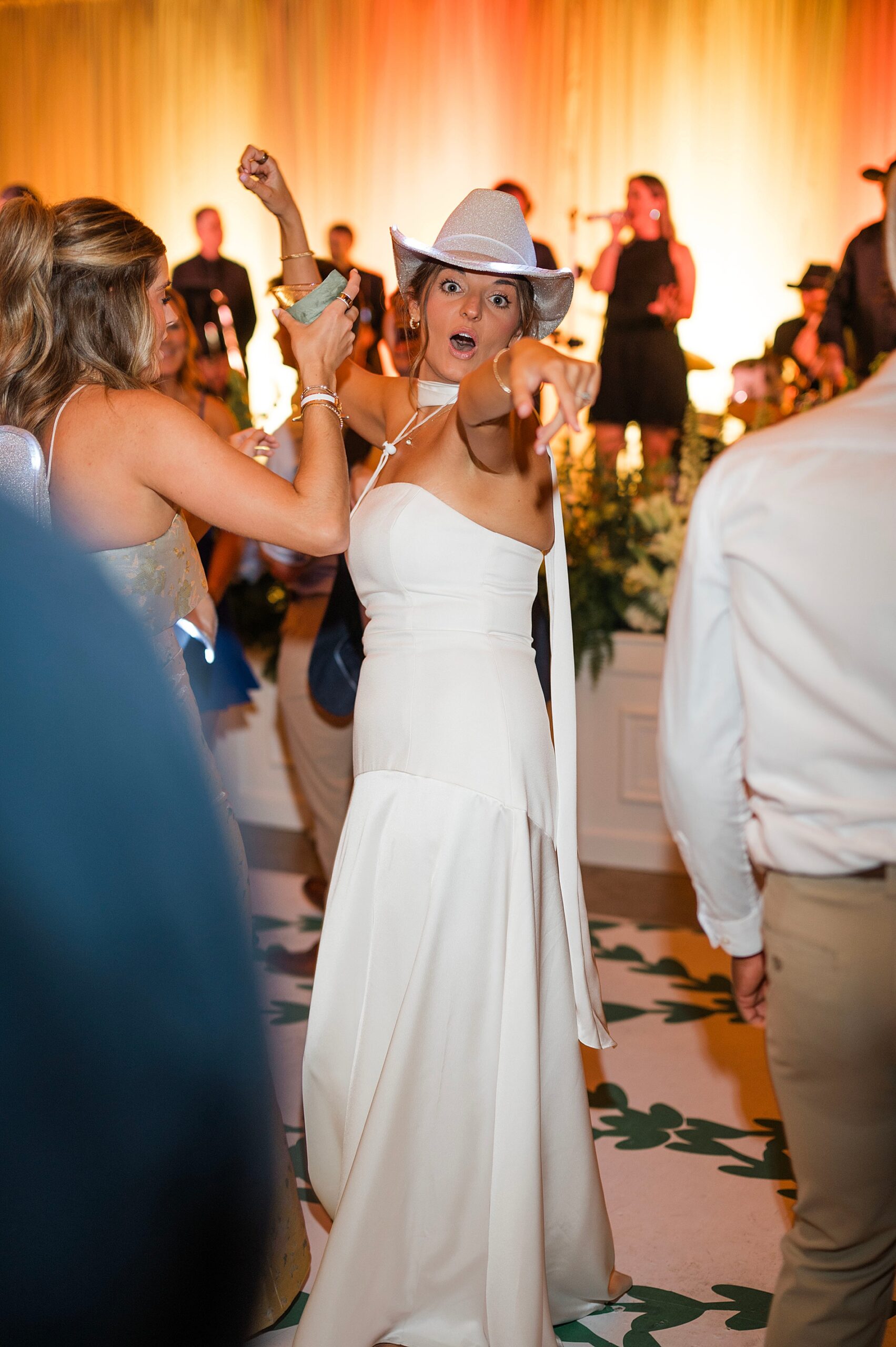bride singing and dancing on dance floor